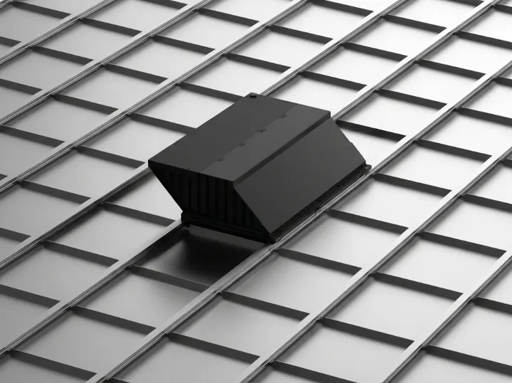The black housing of a Yeelight Skylight P21 seen from above the ceiling, set into a ceiling grid between the ceiling panels